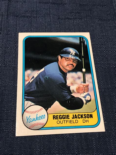 Baseball card with curse word engraved on bat